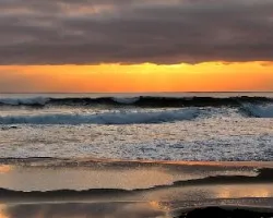 Atardecer a orillas del mar